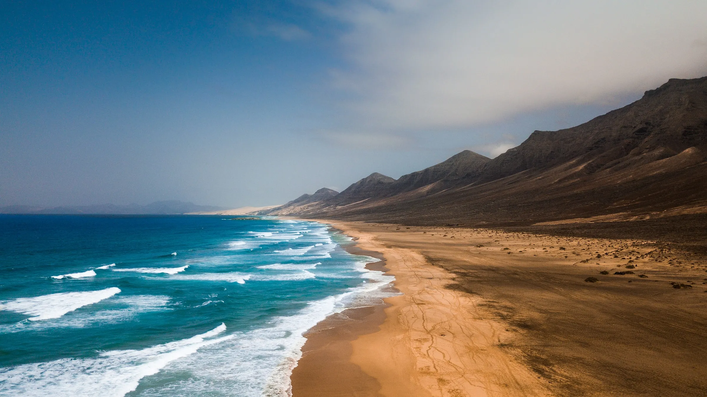Les plages où l'on rêve de se prélasser cet été - Par Wini Sasa. Photo By Marina T On Unsplash