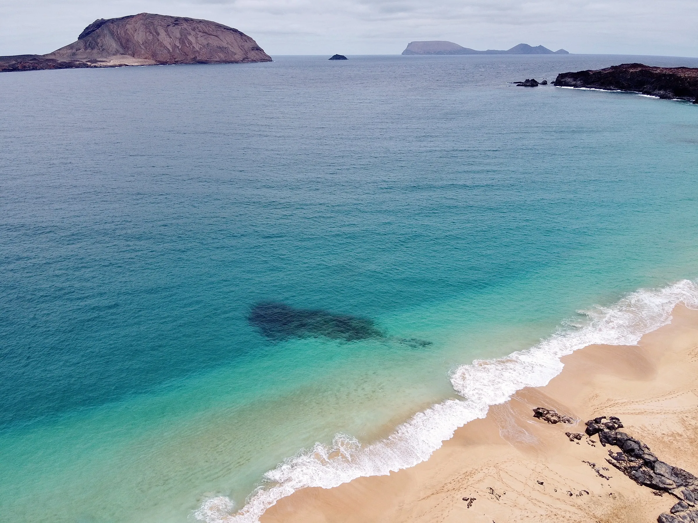 Les plages où l'on rêve de se prélasser cet été - Par Wini Sasa. Photo By Marina T On Unsplash