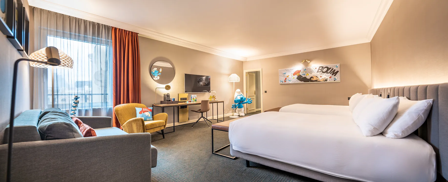Concours exclusif : assistez à l’avant-première des Schtroumpfs et vivez une nuit féérique dans leur suite au Hilton Brussels Grand Place !